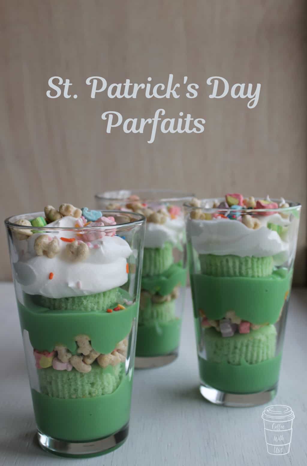 Three St. Patrick's Day parfaits on a white table