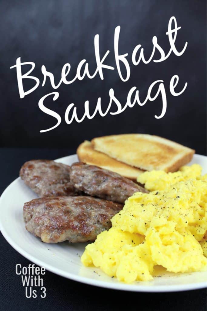 Breakfast sausage patties on a plate with scrambled eggs and toast.