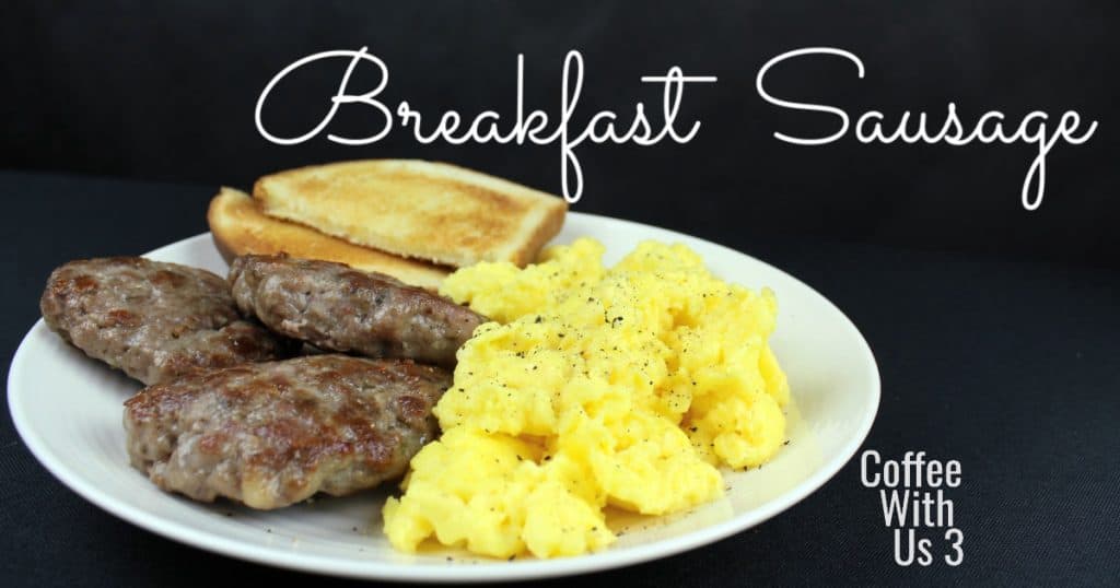 Homemade Breakfast Sausage Patties on a white plate with eggs and toast.