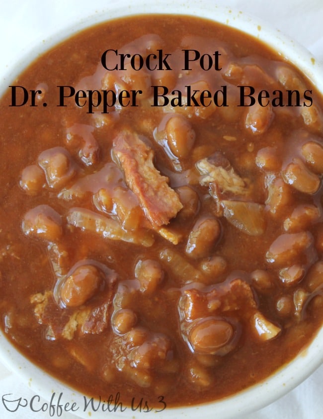 Delicious Crock Pot Dr. Pepper Baked Beans with caramelized onions and bacon! Make this easy slow cooker recipe that's perfect for a BBQ or potluck!