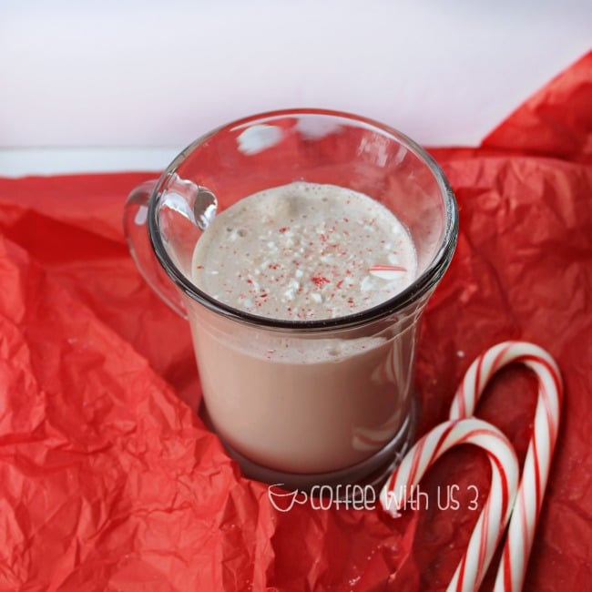 The perfect combination of peppermint and chocolate comes together in this Christmasy Candy Cane Frozen Hot Chocolate Milkshake recipe!