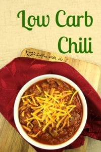 Low Cab Chili topped with shredded cheese with napkin next to bowl.