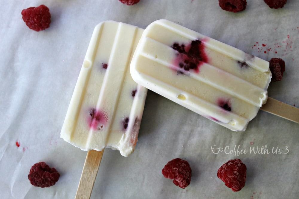Kid approved Raspberry Yogurt Popsicles. Easy to make, delicious and refreshing to eat! The perfect summer treat for the whole family!