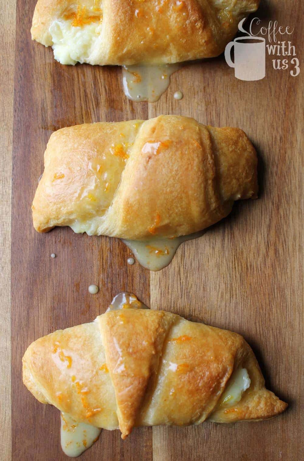 Sweet and delicious Orange Cream Cheese Croissants are a tasty treat that's ready in a flash, by using canned crescent rolls!