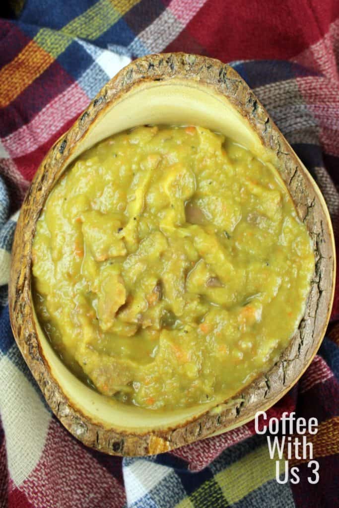 Split Pea Soup in wooden bowl with plaid backdrop