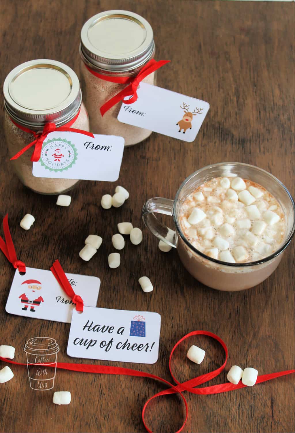 Homemade Hot Chocolate Mix paired with marshmallows and a mug makes a great gift for a teacher, coworker, neighbor, or friend.  Free printable gift tags included!