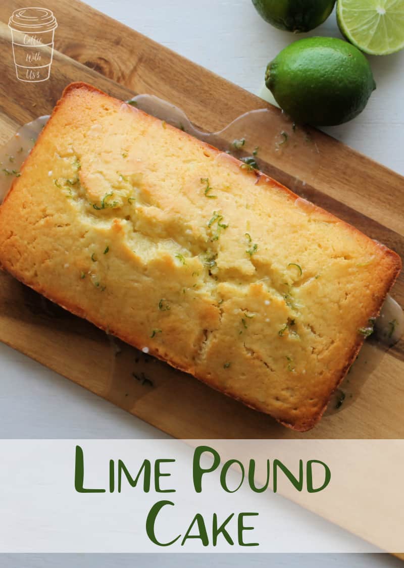Overhead shot of lime pound cake on wooden cutting board, with 3 limes nearby